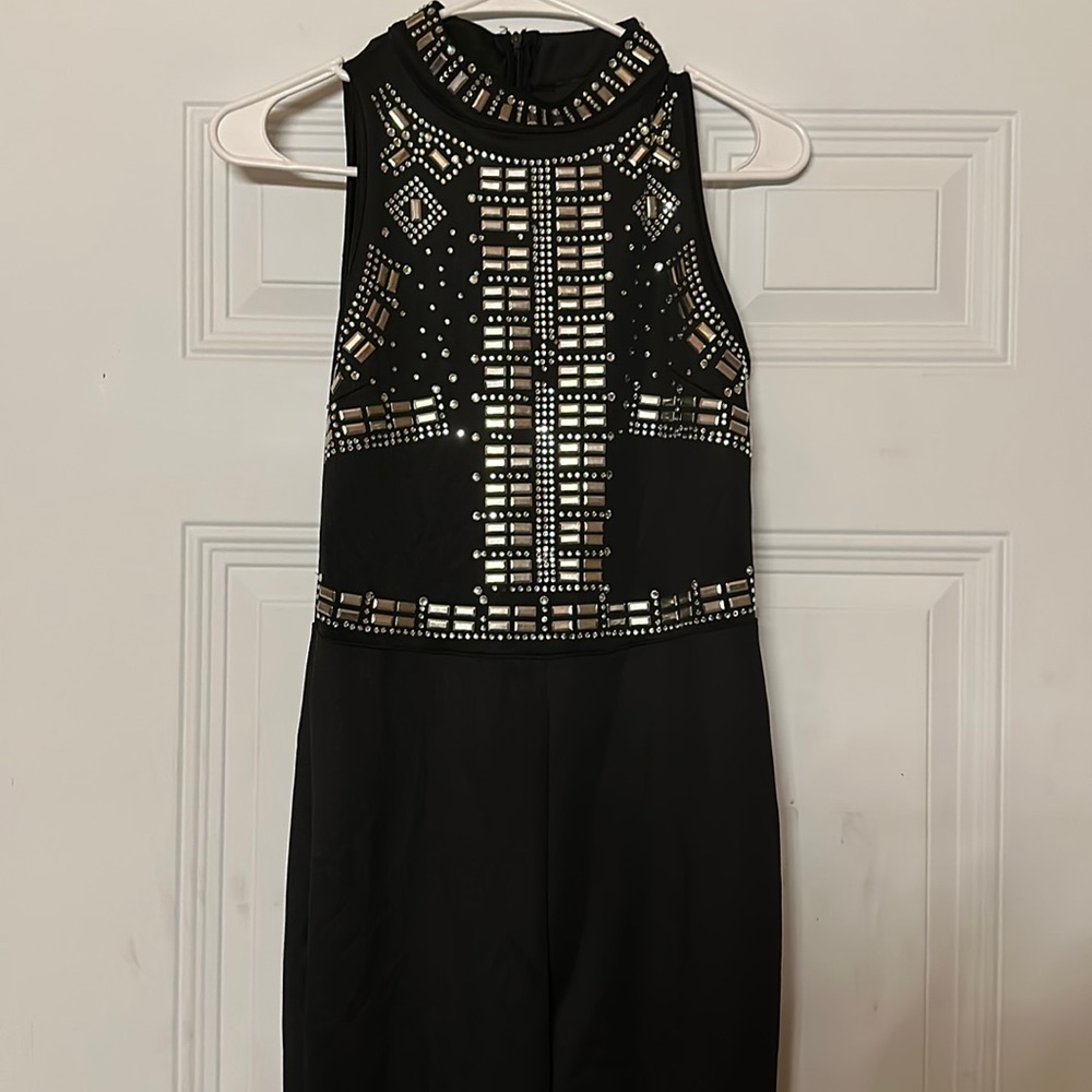 Black onesie with gems on the top